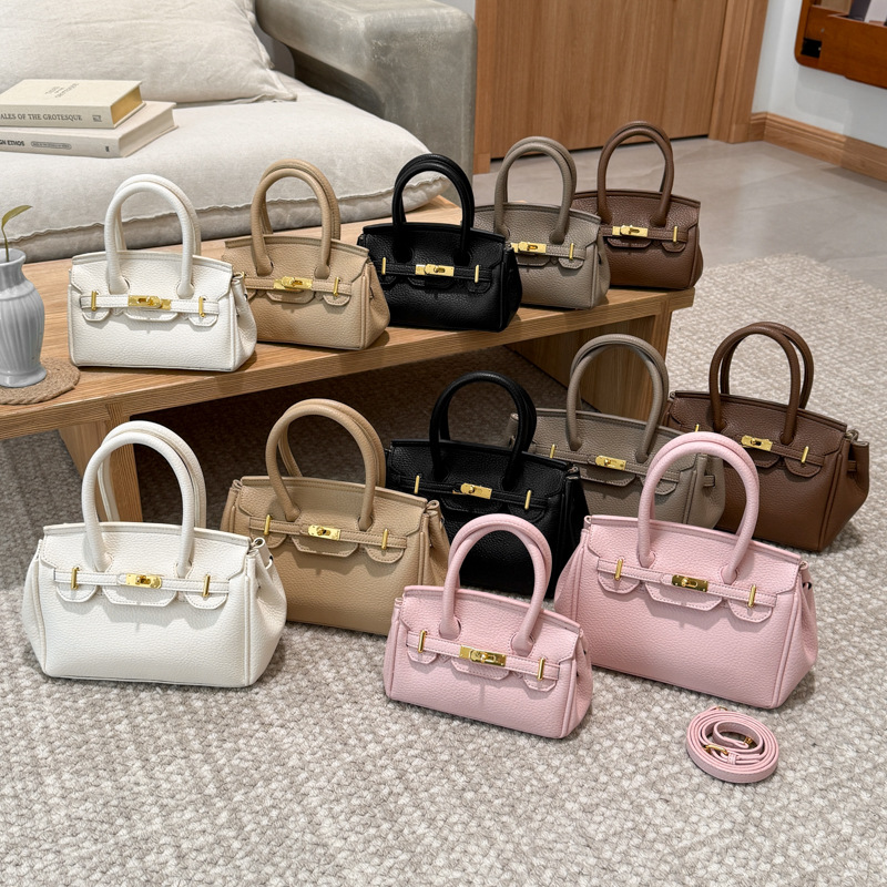 Textura de nicho de diseño de platino de mujer 2026 nuevo estilo simple de moda diaria de un solo hombro bolsa de tramo inclinada image 1