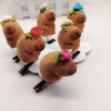 Капибара с розой