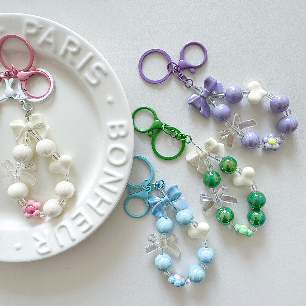 Arco de cuentas colgante llavero colgante decoración estrella de cinco puntas colgante caso de teléfono móvil colgante bolso de mujer colgante red