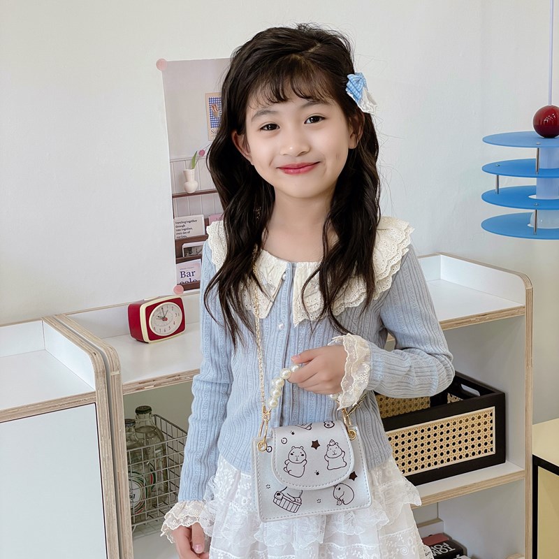 Versión coreana del bolso de hombro para niños Xiaoxiangfeng, lindo y divertido Kapibala, bolso de perlas para niños, nuevo bolso de cadena para niños