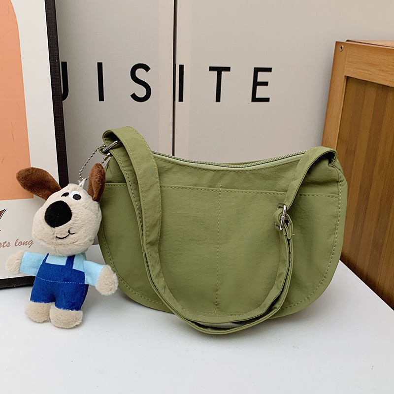 Bolsa de hombro coreana para niños y niñas de color sólido de gran capacidad bolsas de饺os para niños 2025 nuevas bolsas para niños con colgantes