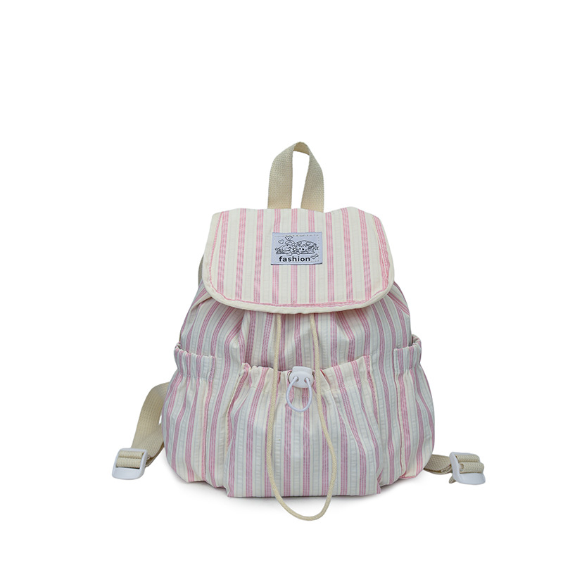 Bolsa de lona a rayas casuales de viento universitario para mujeres verano 2026 nueva mochila simple de gran capacidad mochila de estudiantes