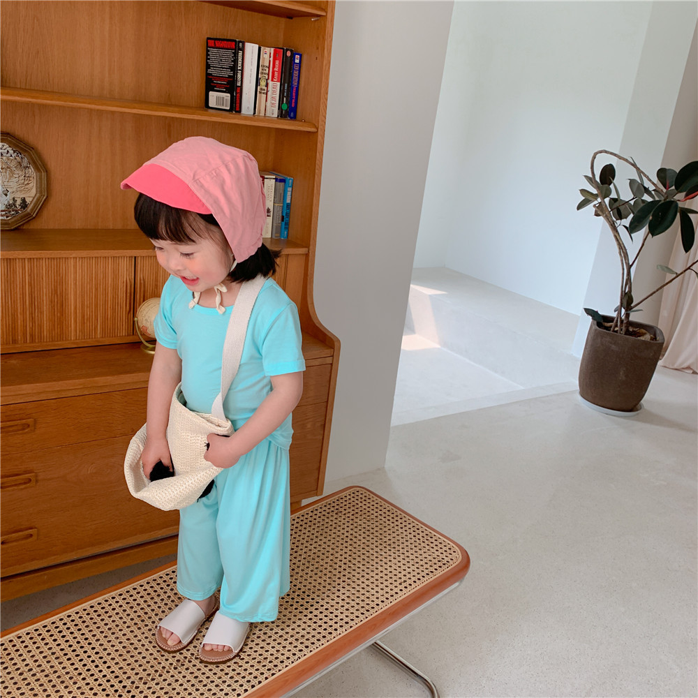 Corea del Sur ropa para niños al por mayor 2024 primavera y verano de los niños delgados color sólido desgaste del hogar traje bebé camiseta 7 pantalones dos piezas