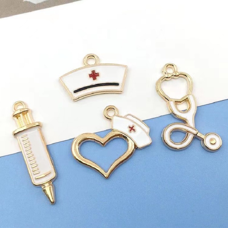 15*27MM, 25*15mm, 28*25mm Jewelry Making Size DIY Jewelry Accessories Classification 10 PCS/Package Quantity Alloy Material 10 PCS/Package 15*27MM 25*15mm 28*25mm Alloy Nurse Hat Heart Shape Needle Pendant