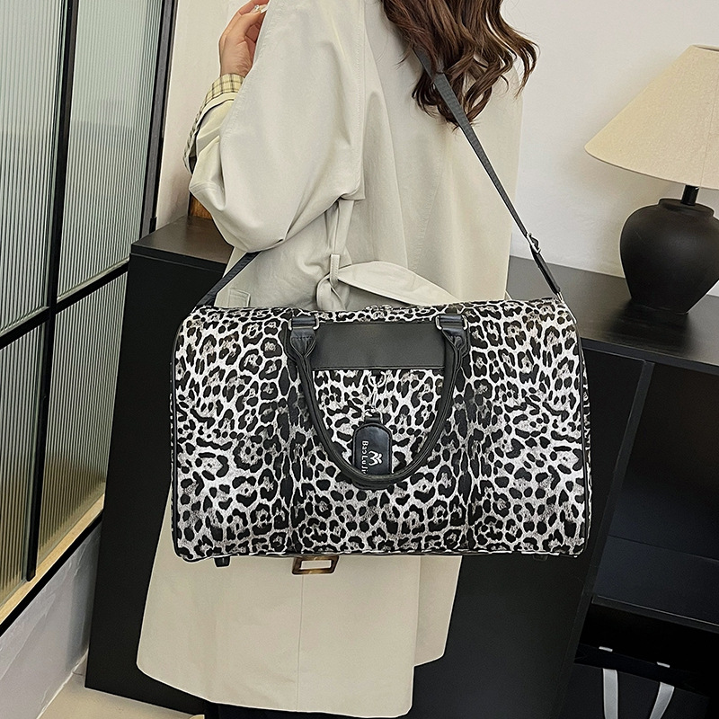 Borsa da viaggio Borsa da viaggio portatile personalizzata Design di nicchia Grande capacità Stampa leopardata Può essere impostata Tirare il bagaglio a mano_voghion.com