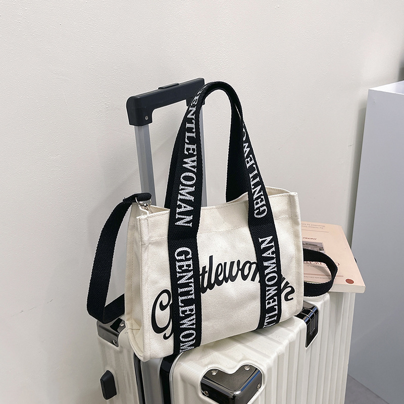 GentleWoman hombro letras bolso de lona portátil 2025 nuevo tailandés nicho transfronterizo bolso de hombro