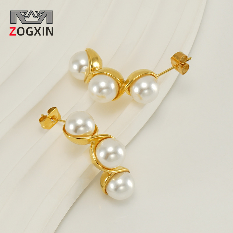 Cruz-frontera nueva de acero inoxidable perla guisante pendientes hembra europeo y americano nicho versátil titanio acero Luz de lujo pendientes al por mayor