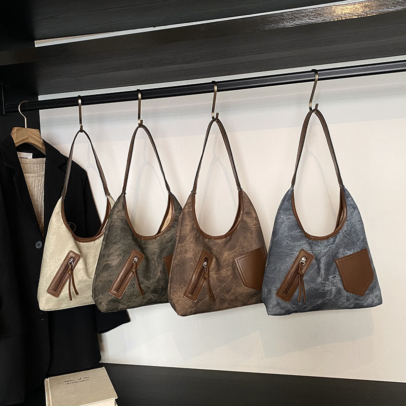 2025 nueva tendencia de gran capacidad bolsas de hombro de moda para viajar al trabajo bolsas de mochilas de color contrastante empalme de moda bolsas de mujer