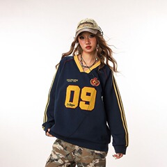 卸売りアメリカの重ポンドヒップホップの女性2025春の新型vネックのユニフォームのカップルの服装のゆったりしたコートの男性の潮