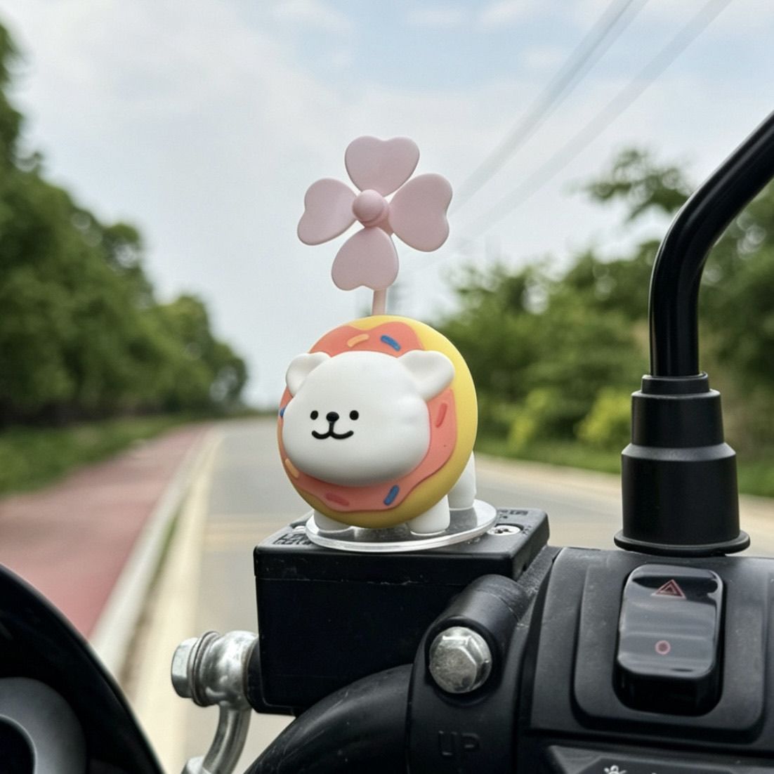 Bicycle dog figurine, windmill line dog ornament, electric vehicle decoration, cute motorcycle accessory