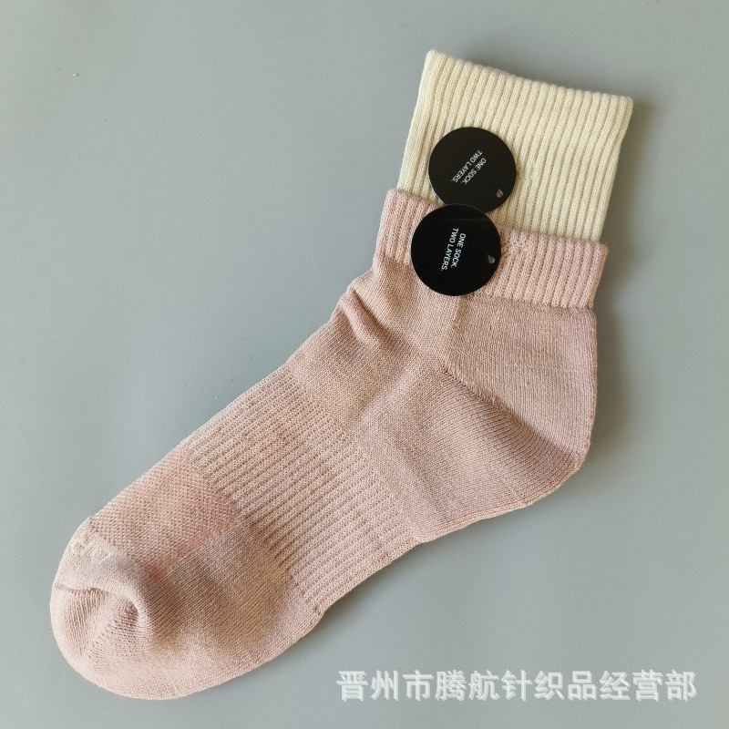 蘇万ナイキの靴下のカラーの二重は男女の中で長い筒のタオルの底のスポーツの靴下をつなぎ合わせてバスケットボールの靴下を走ります。