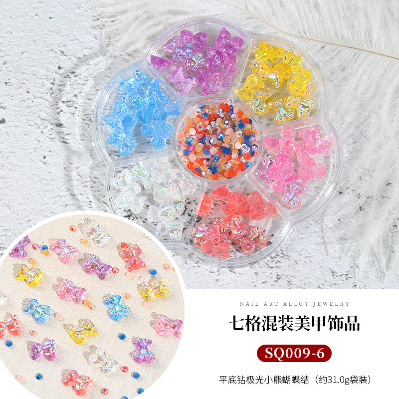 Seven-grid mixed Camellia nail jewelry bow flat diamond lollipop nail pequeña bola de acero Pearl Square Diamond