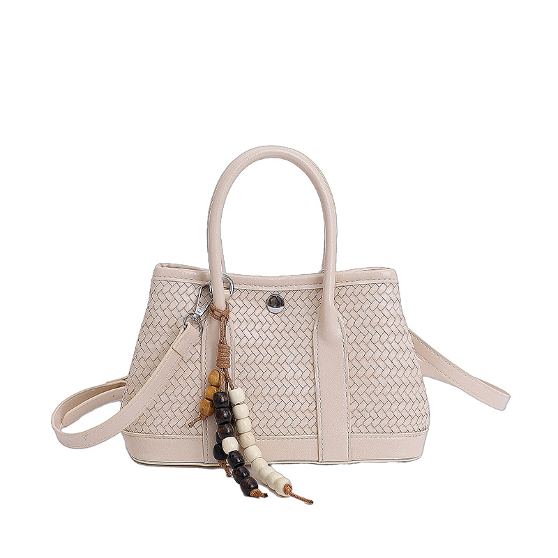 Bolsa de mano de alto nivel transfronterizo trenzada bolsa de cubo de agua para mujeres otoño y invierno 2025 nuevo estilo extranjero bolso de hombro bolso de mochila versátil