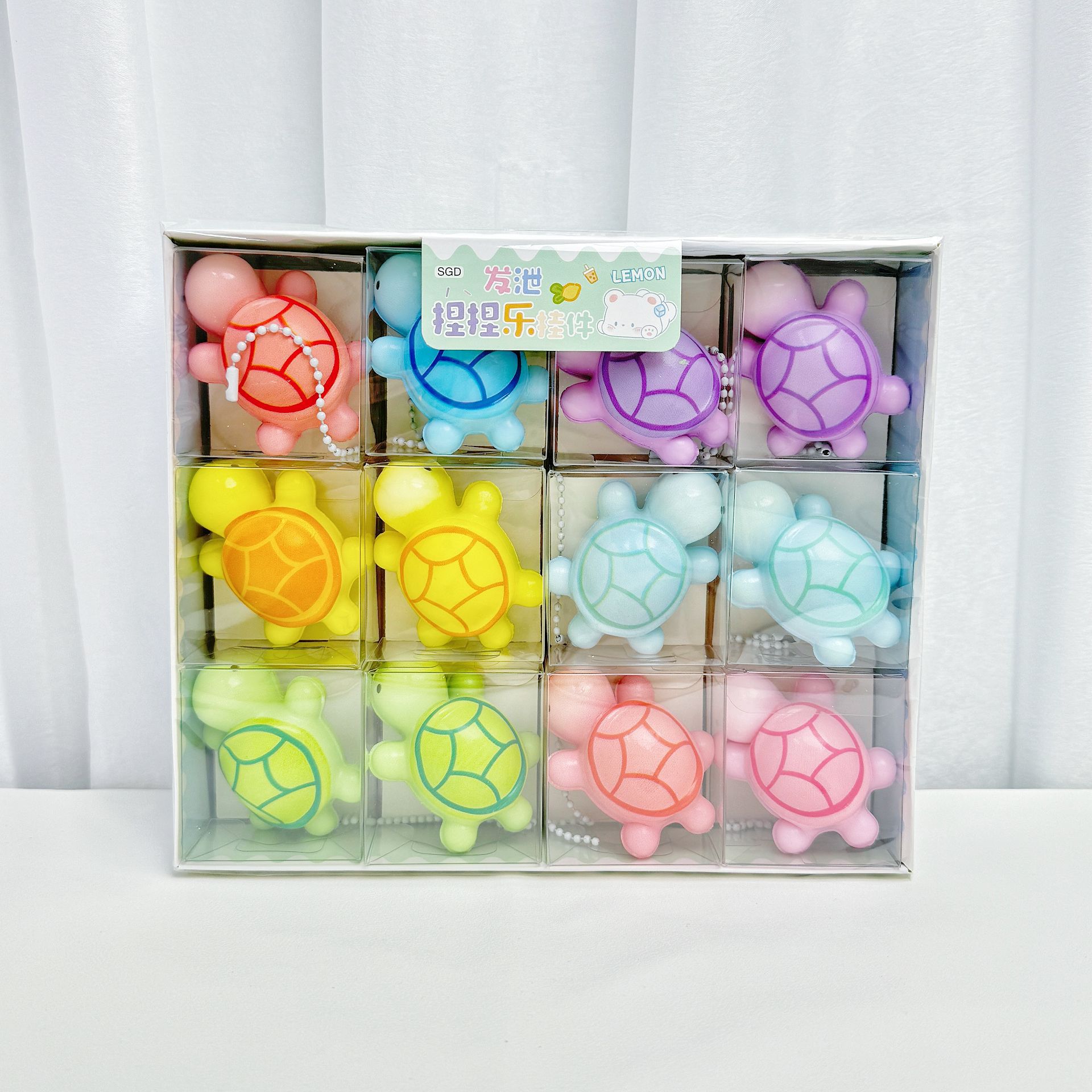 B colgante de pellizco de rebote lento de tortuga/una caja completa de 24 piezas/un pequeño regalo