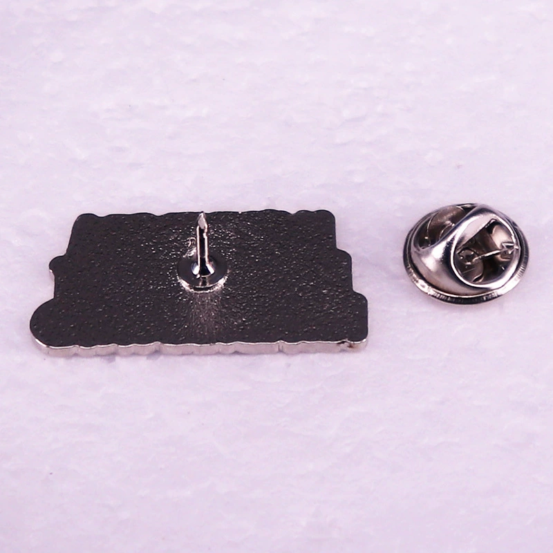 Brooch, badge, bag accessory