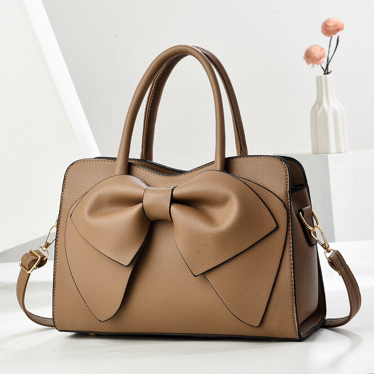 Bolso de mano con textura de lazo 2025 nuevo bolso de hombro versátil de color sólido para mujer, bolso cruzado, bolsos transfronterizos
