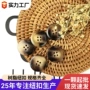 圆形凹面花纹复古四眼扣