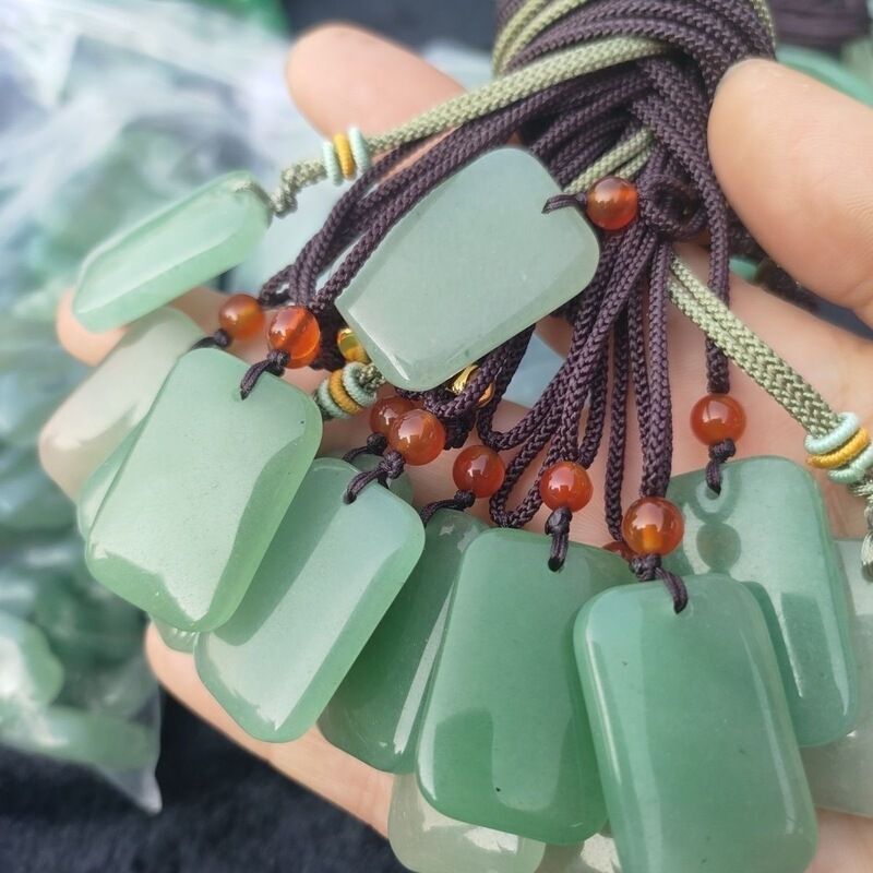 Manufacturer's natural aventurine jade "bread-shaped" pendant in lake green, "No Worries" amulet, clear water color peace pendant, jade necklace Manufacturer's natural aventurine jade "bread-shaped" pendant in lake green, "No Worries" amulet, clear water color peace pendant, jade necklace