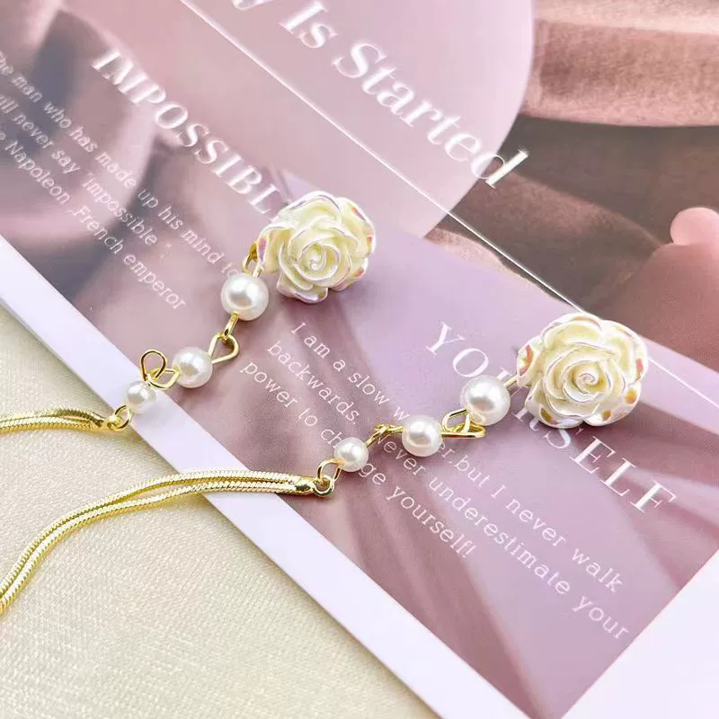 White long mountain tea, small design sophisticated earrings with tassels from pearl, french style, simple and elegant design