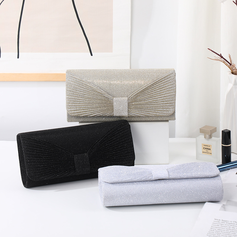 Elegant small clutch bag with bow for bride