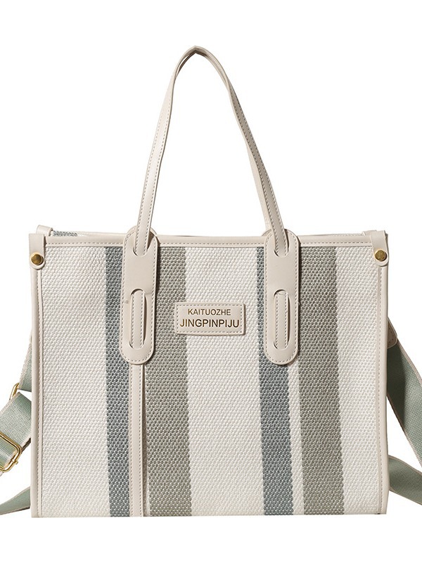 Bolso Tote portátil a rayas de color de contraste de lona para mujer 2024 nueva textura de moda transfronteriza bolso de mensajero de un solo hombro
