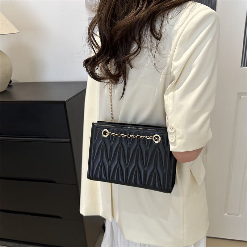 Bolsa de cadena de textura de alta calidad para mujer 2024 nueva moda rombo viajero de un solo hombro mensajero de nicho bolso cuadrado pequeño Tote