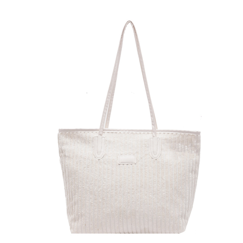 Verano 2024 invierno de gran capacidad de meandruño nuevo nicho simple de viaje de mano bolsa de hombro para mujeres