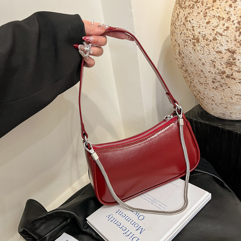 Bolso de axila retro de nicho francés para mujer 2025 nuevo bolso de bandolera con cadena de alta calidad portátil