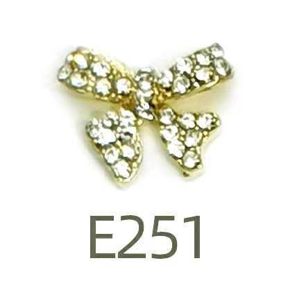 Transfronterizo Japonés arco de uñas accesorios de pajarita caliente simple todo fósforo tridimensional hueco joyería de uñas de diamantes al por mayor