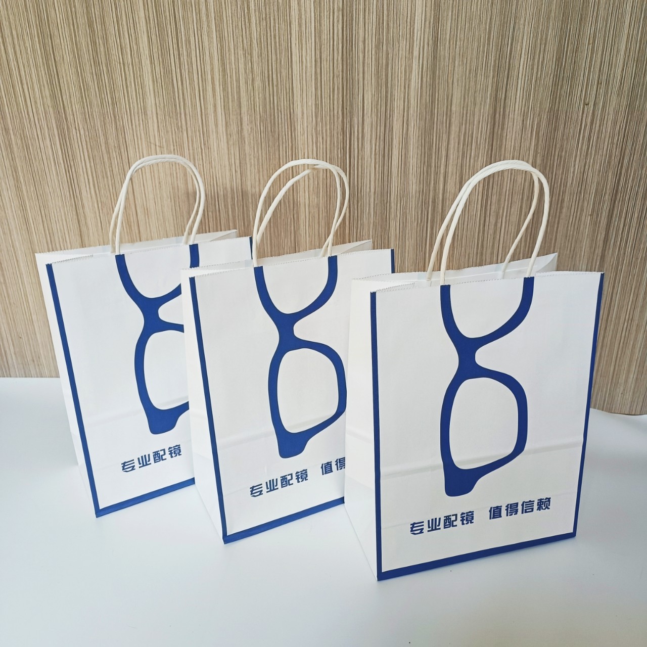 眼镜店手提袋批发眼镜纸袋可定眼科医院袋子包装袋礼品袋印刷logo