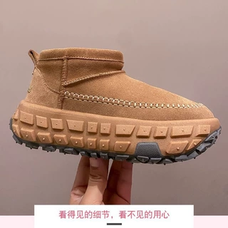 加绒加厚轮胎底雪地靴男女户外防滑防水新款皮毛一体增高棉鞋
