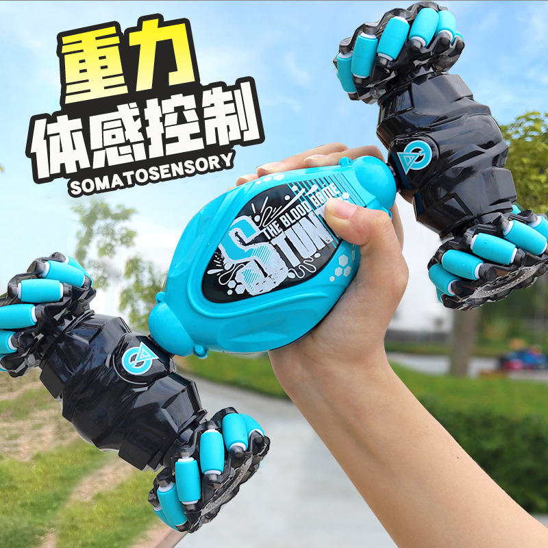 1: 14 Cross-border exclusivo para control remoto coche de torsión RC coche de juguete luces todoterreno música acrobacias coche de detección de gestos