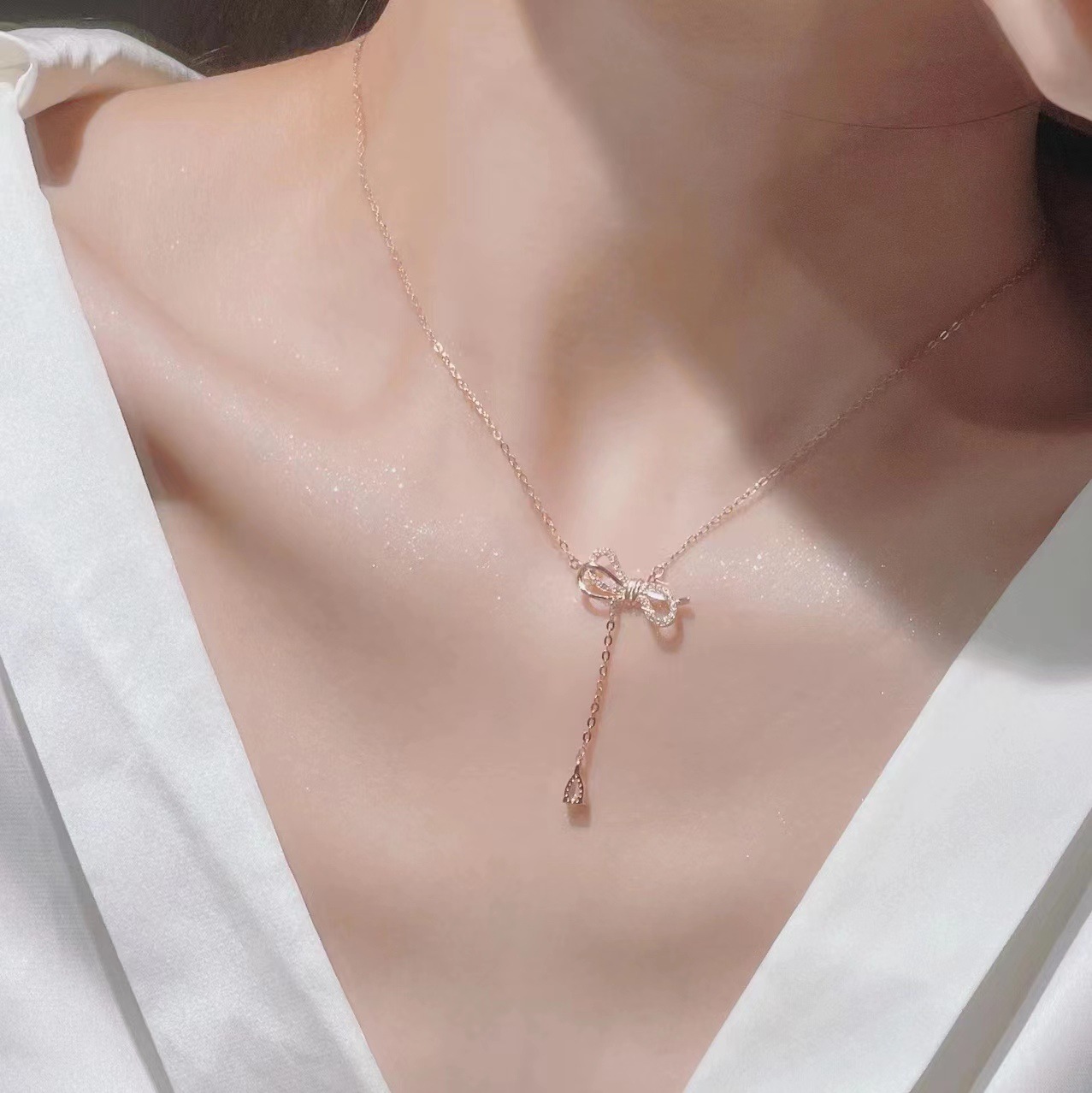 Sweet Bow Knot Silver Plated Tassel Plating Inlay Zircon Women's Pendant Necklace display picture 3