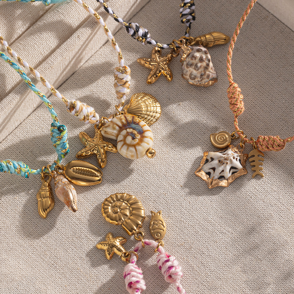 Tena nueva colección de océano creativo pulsera de acero inoxidable para niñas caracol de cerámica colgante de acero de titanio joyería de mano de concha