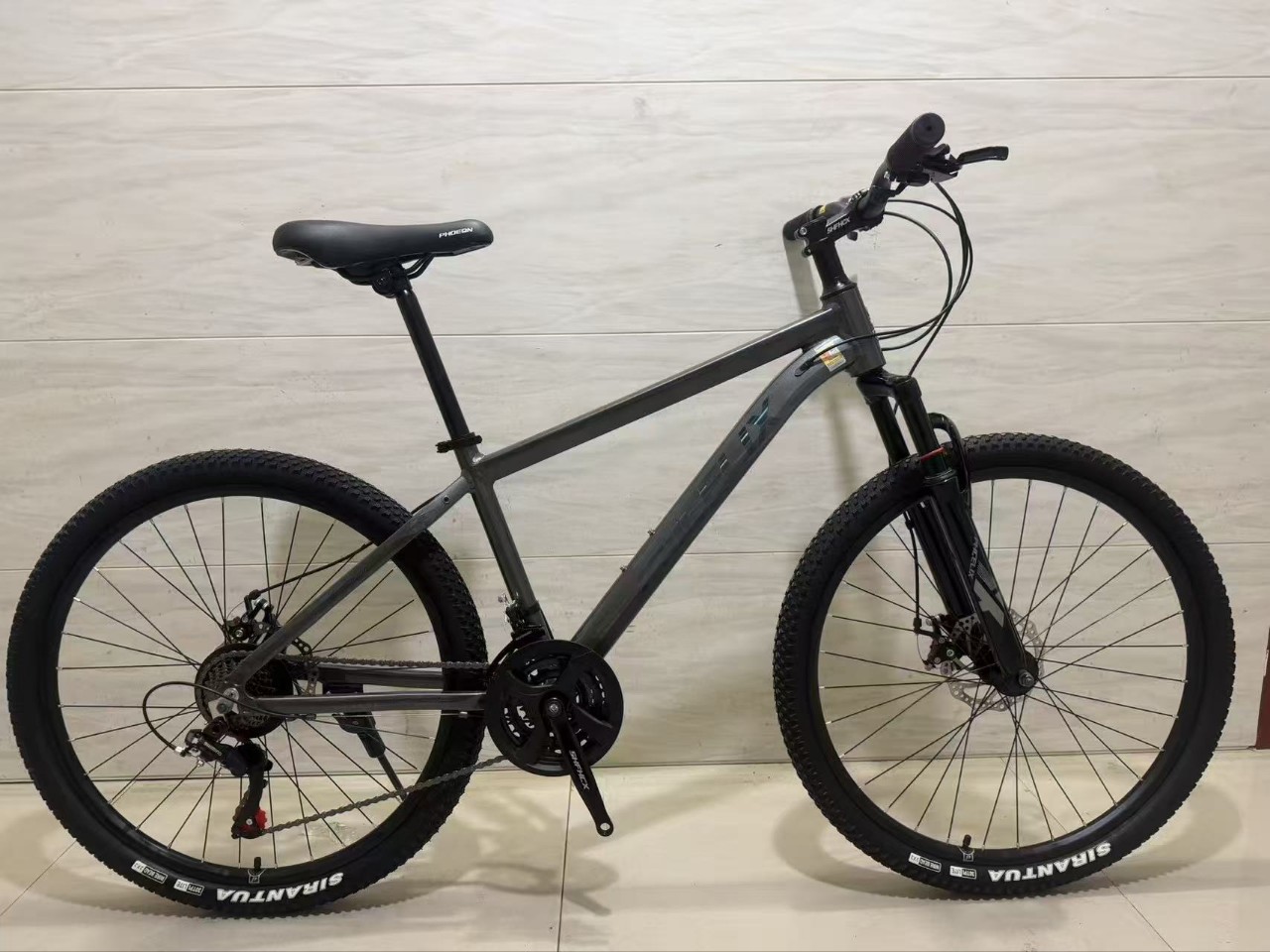 Bicicleta de montaña de 24 pulgadas 26 pulgadas 21 velocidades de amortiguación bicicleta de velocidad variable para hombres