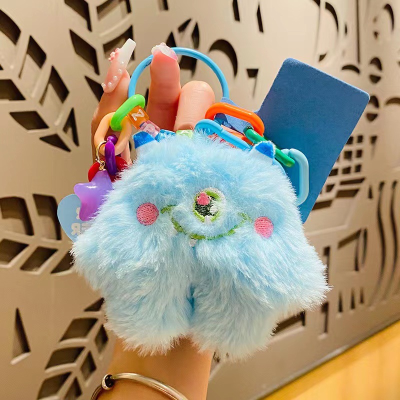 [Venta caliente] genuino de peluche monstruo coche llavero par colgante de teléfono móvil colgante bolsa colgante