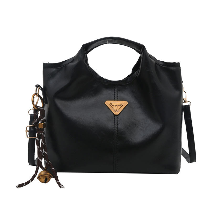 Bolso de mano retrógrado nicho mujer 2025 nuevo estilo de piel de cera de aceite para viajar bolso de hombro de gran capacidad relajado mochila