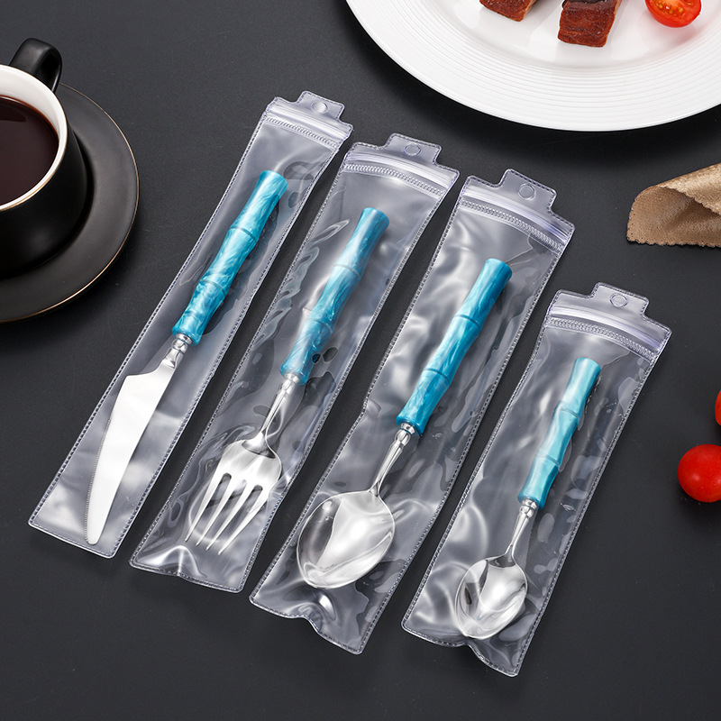 Cuchillos, tenedores y cucharas de vajilla de acero inoxidable 304 Juego de vajilla de hotel europeo y americano Cuchillos y tenedores de bambú de acrílico blanco glaciar creativo