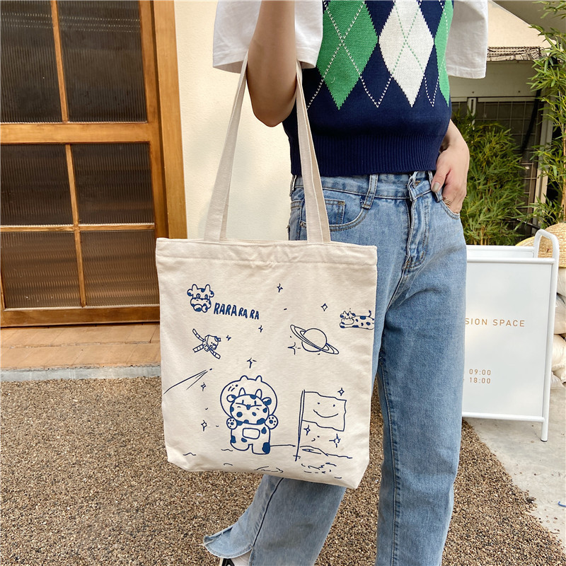 【 In Stock 】13173 Cute Moon Landing Cow single-shoulder Bag, student girls' schoolbag, canvas bag, large capacity wholesale undefined