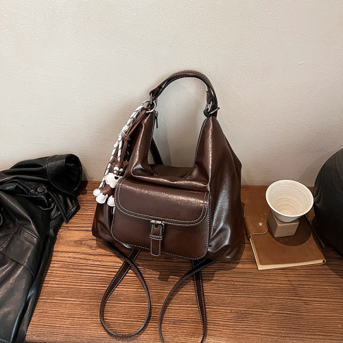 The 2025 trending minimalist versatile bags, made of oil wax leather PU material, with large pockets, suitable for travel and commuting, available in single shoulder and crossbody styles as well as backpack options.
