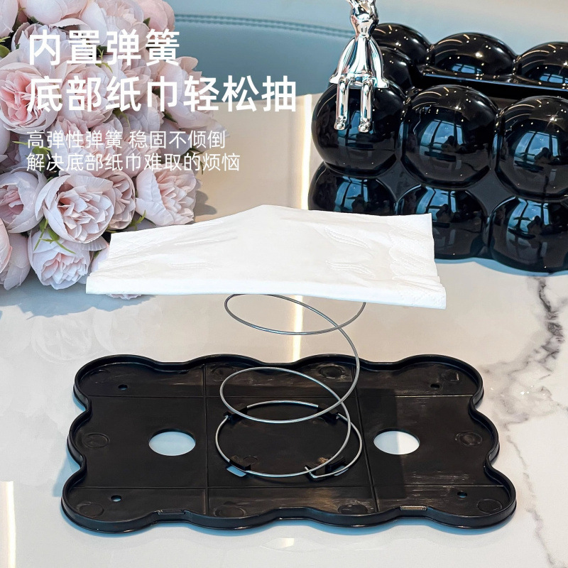 高級感のある収納ケースの新型の軽贅沢家庭用創意トイレティッシュボックスのリビングのテーブルの上に紙ナプキンを引き出します。