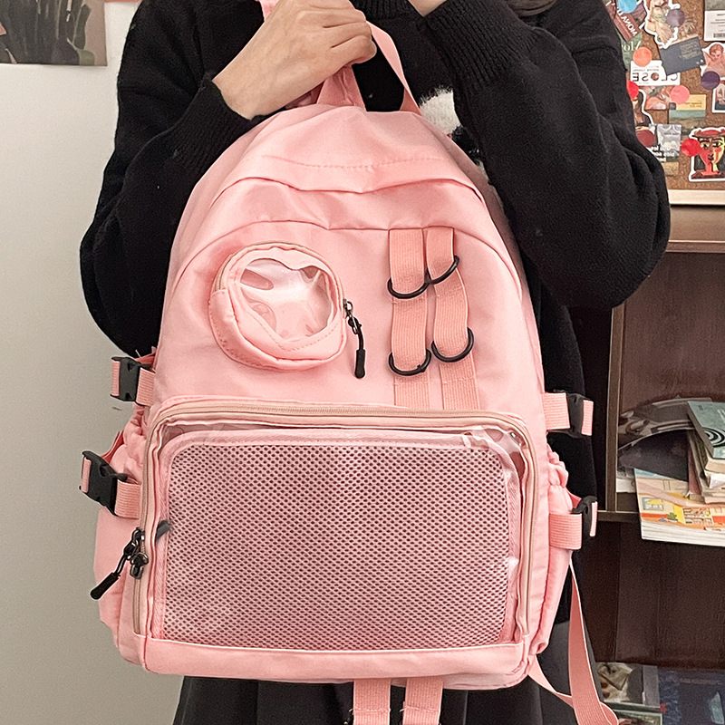 Mochila japonesa pequeña y fresca de chicas, moda simple y sólida, mochila de estudiantes de secundaria, nueva mochila de gran capacidad para mujeres.