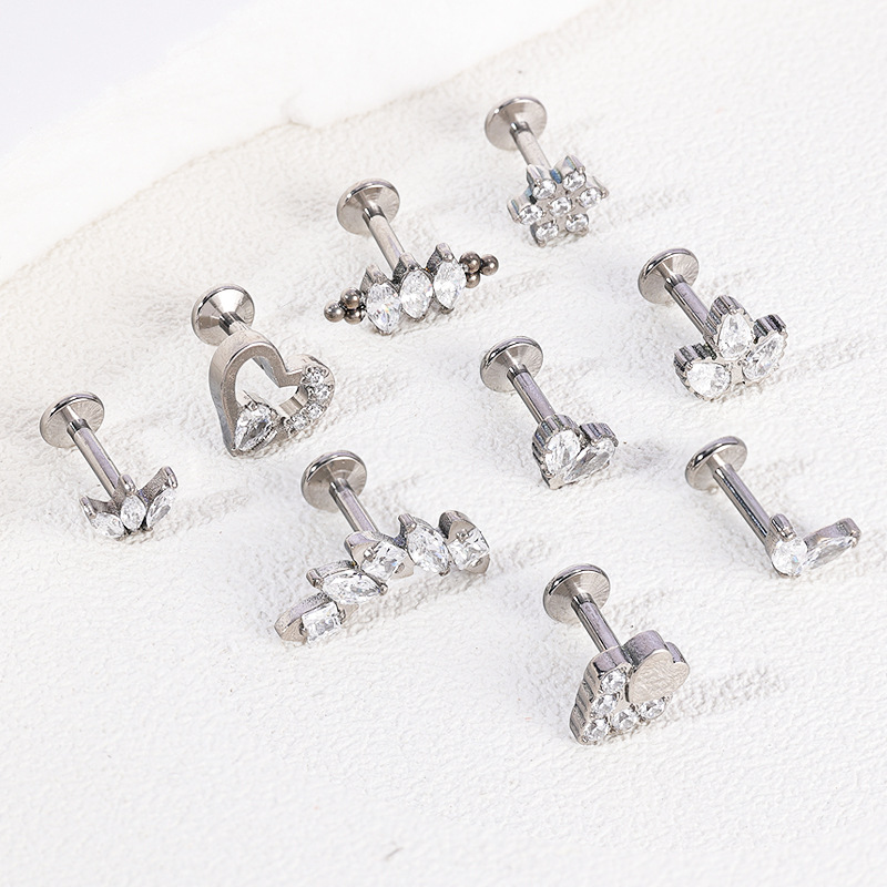 Silver pointed spike labret stud material detail