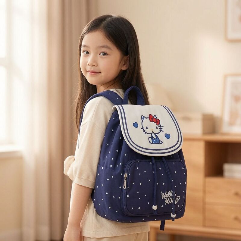 Children's navy-style backpack, featuring a Hello Kitty cartoon and polka dot design, with a drawstring closure, cute and adorable, suitable for girls and students Children's navy-style backpack, featuring a Hello Kitty cartoon and polka dot design, with a drawstring closure, cute and adorable, suitable for girls and students