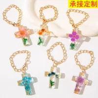 European and American popular new product resin dried flower cross keychain Christian bottle handle decorative cup chain women's backpack pendant