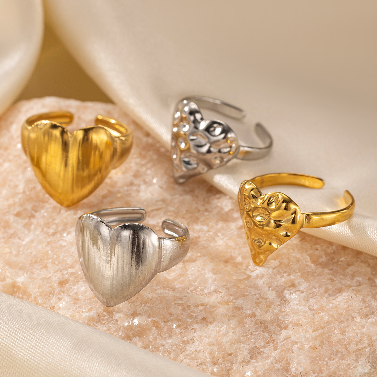 Taena anillo de acero inoxidable europeo y americano femenino no se desvanece, amor irregular, patrón de martillo, anillo de acero de titanio, joyería explosiva transfronteriza