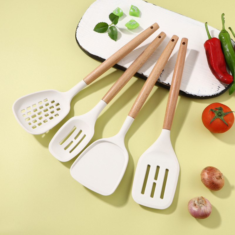 Nuevo conjunto de utensilios de cocina de silicona 11 piezas de mango de madera para el hogar, cocina de cocina frita con barril de almacenamiento