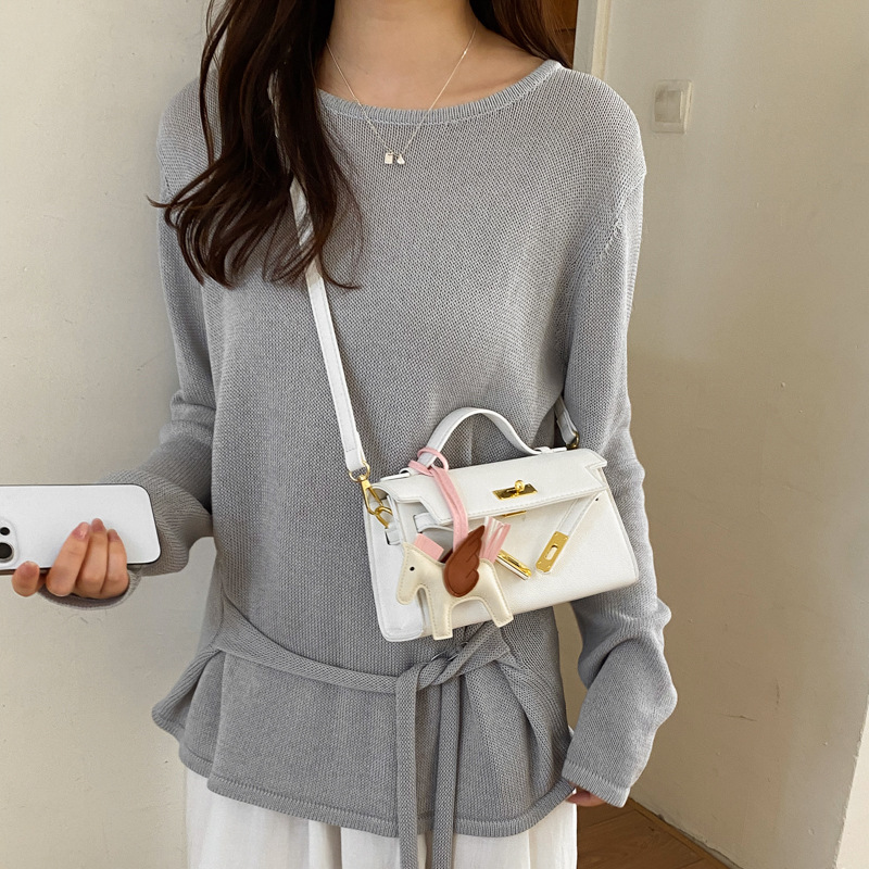 Texturas bolsos Kelly mujeres 2026 verano nuevo estilo de moda simple mochila diaria bolso de mano super caliente bolso pequeño image 5