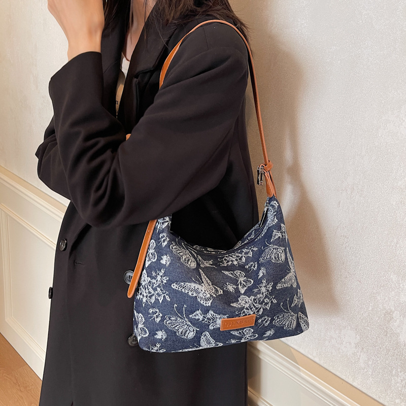 2024 nuevo bolso de viaje de mezclilla casual de gran capacidad con estampado de todo fósforo para mujer bolso de axila de un solo hombro