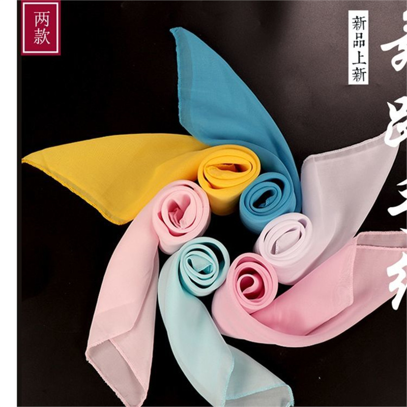 Dance scarves, handkerchiefs, children's grading exam chiffon square scarves, and scarves; a girl is performing Jiaozhou Yangko dance props.